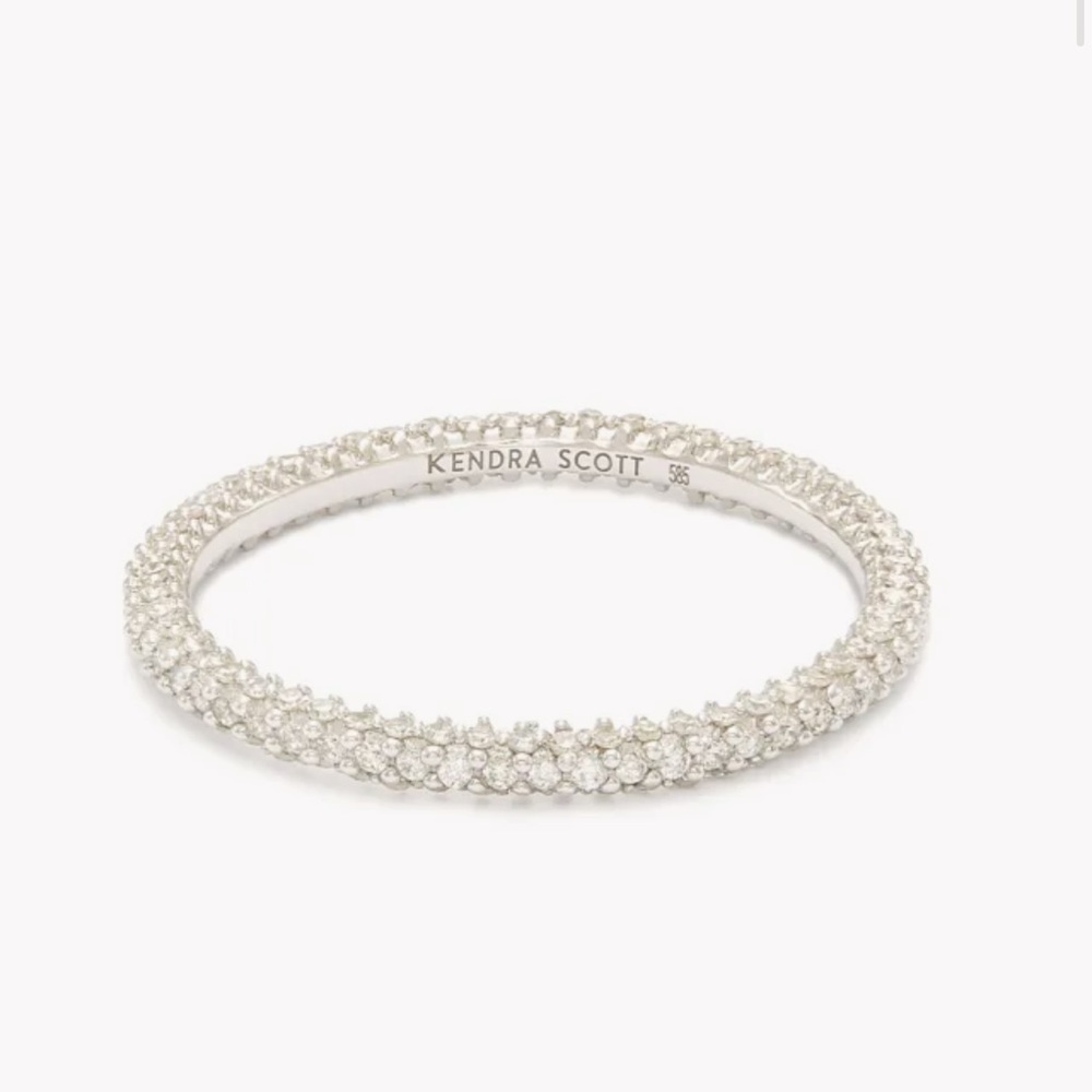 ISO Kendra Scott Remi ring in white gold or yellow gold in a size 6-8.